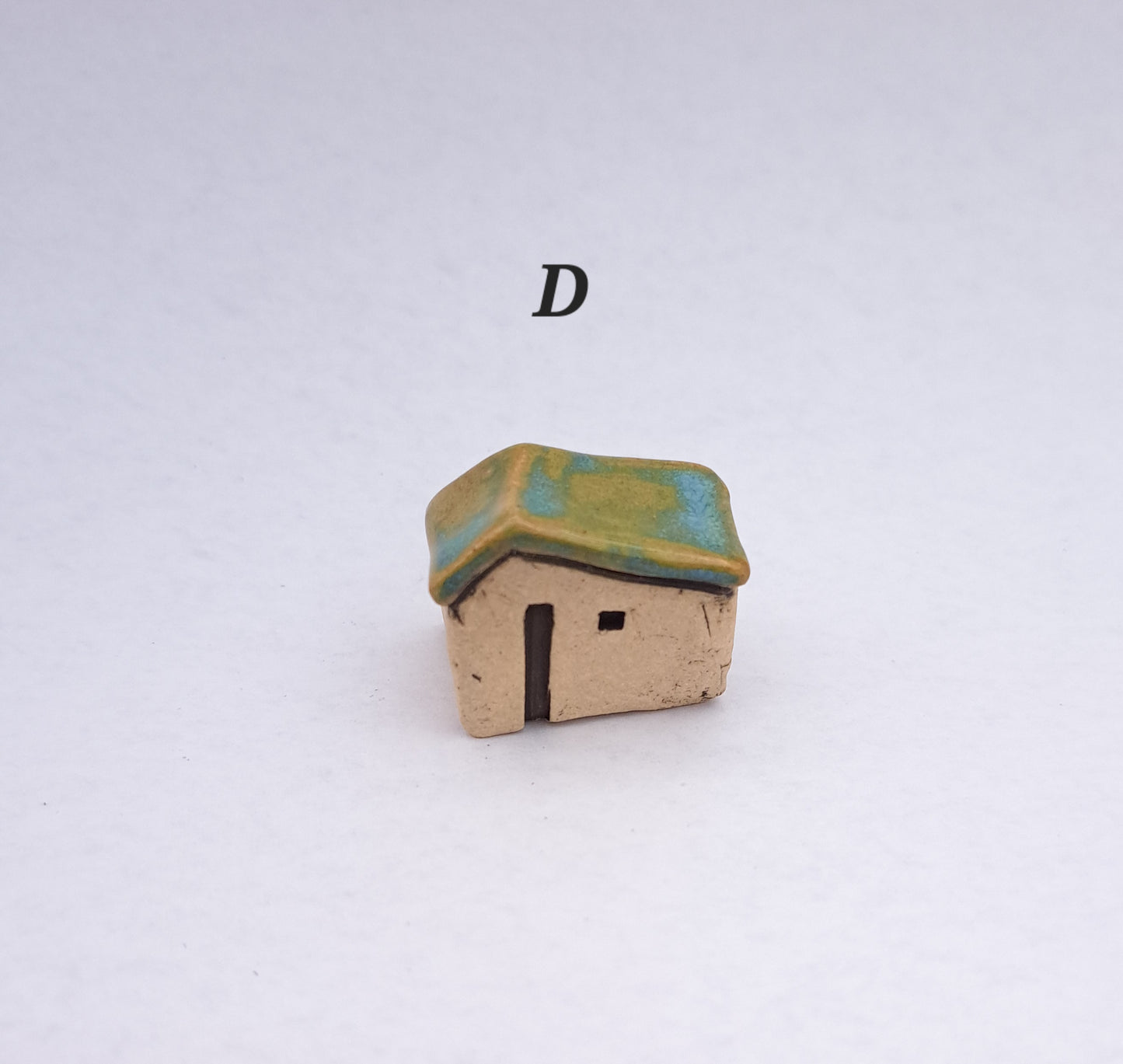 Green/Light Blue Roofed Houses