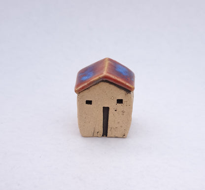 Red/ Bright Blue Roofed House