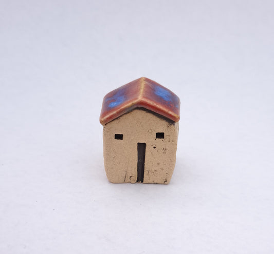 Red/ Bright Blue Roofed House