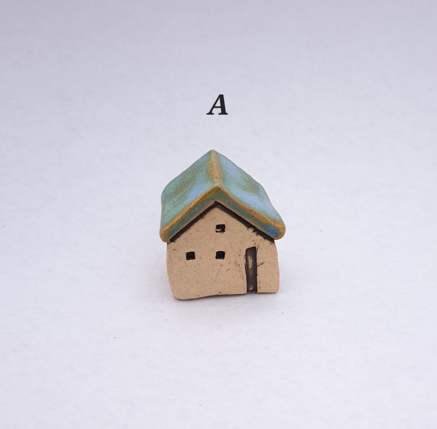 Green/Light Blue Roofed Houses
